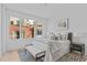 Spacious bedroom with large windows and stylish decor at 3005 Corbell Rd, Durham, NC 27701