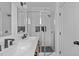 Modern bathroom with double vanity and glass shower at 3005 Corbell Rd, Durham, NC 27701