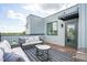Relaxing rooftop deck features modern furniture and city views at 3005 Corbell Rd, Durham, NC 27701