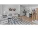 Open concept living room with stylish sofa and kitchen views at 3005 Corbell Rd, Durham, NC 27701