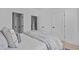Comfortable bedroom with doors to hallway and bath at 3005 Corbell Rd, Durham, NC 27701