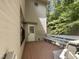 Wooden deck with benches offering a wooded view at 612 13Th St, Butner, NC 27509