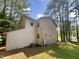 Rear view of home, showcasing siding and yard at 612 13Th St, Butner, NC 27509