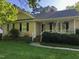 Ranch style home with front porch and landscaping at 8108 N Creek Run, Raleigh, NC 27613