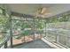 Relaxing screened porch overlooking a grassy yard at 185 Weatherbend, Pittsboro, NC 27312