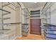 Walk-in closet with ample shelving and drawers at 407 Weaver Mine Trl, Chapel Hill, NC 27517