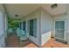 Front porch with light teal rocking chairs and a wood floor at 407 Weaver Mine Trl, Chapel Hill, NC 27517