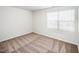 Bright bedroom featuring neutral carpeting and window blinds at 204 Shelfit Trl, Oxford, NC 27565