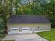 Large detached garage featuring three-car capacity at 126 Yuma Dr, Louisburg, NC 27549