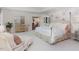 Elegant Primary bedroom with a large bed, sitting area, and floral wallpaper at 50211 Manly, Chapel Hill, NC 27517