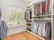 Well-organized closet with custom shelving and hanging rods at 50211 Manly, Chapel Hill, NC 27517