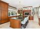 Gourmet kitchen with island, granite countertops, and stainless steel appliances at 50211 Manly, Chapel Hill, NC 27517
