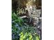 Relaxing patio with seating area, surrounded by lush greenery at 50211 Manly, Chapel Hill, NC 27517