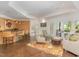 Large recreation room with wet bar, seating area, and access to the outdoors at 50211 Manly, Chapel Hill, NC 27517