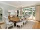 Formal dining room with chandelier, hardwood floors, and French doors at 50211 Manly, Chapel Hill, NC 27517