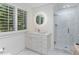 Modern bathroom with a large vanity and a walk-in shower at 50211 Manly, Chapel Hill, NC 27517