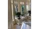 Bright entryway with large windows and potted plants at 50211 Manly, Chapel Hill, NC 27517