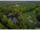 Luxury home nestled on a golf course with beautiful wooded surroundings at 50211 Manly, Chapel Hill, NC 27517