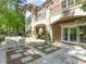 Stone patio with seating and access to the house at 50211 Manly, Chapel Hill, NC 27517