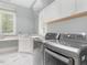 Bright laundry room with modern washer and dryer at 50211 Manly, Chapel Hill, NC 27517