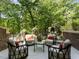 Private patio with comfortable seating and lush green surroundings at 50211 Manly, Chapel Hill, NC 27517