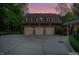 Three-car garage with ample space and attractive exterior at 50211 Manly, Chapel Hill, NC 27517