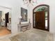 Elegant entryway with large artwork and high ceilings, setting a sophisticated tone at 50211 Manly, Chapel Hill, NC 27517