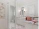 Spa-like bathroom with a glass shower, built-in bench, and modern vanity at 50211 Manly, Chapel Hill, NC 27517