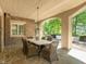 Outdoor patio with wicker dining set and access to backyard at 50211 Manly, Chapel Hill, NC 27517