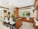 Eat-in kitchen with granite island and ample cabinet space at 50211 Manly, Chapel Hill, NC 27517