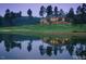 Community clubhouse overlooking a serene lake and golf course at 50211 Manly, Chapel Hill, NC 27517