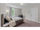 Bright bedroom with a queen-size bed and a work desk at 2517 Snyder Ln, Wake Forest, NC 27587