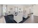 Bright and airy living room with hardwood floors and plenty of natural light at 521 Impala Trce, Wendell, NC 27591