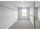 Spacious walk-in closet with ample shelving and rods at 521 Impala Trce, Wendell, NC 27591
