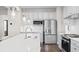 Modern kitchen features stainless steel appliances and white cabinetry at 521 Impala Trce, Wendell, NC 27591