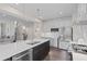 Eat-in kitchen with island, stainless steel appliances, and hardwood floors at 521 Impala Trce, Wendell, NC 27591