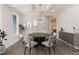 Bright dining room with a round table and modern chandelier at 600 Darian Woods Drive,, Holly Springs, NC 27540