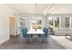 Dining area with marble table and view of backyard deck at 600 Darian Woods Drive,, Holly Springs, NC 27540