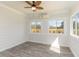 Bright sunroom with tile flooring and lots of windows at 600 Darian Woods Drive,, Holly Springs, NC 27540