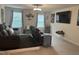 Home theater with tiered seating and large screen TV at 5011 Manderleigh Dr, Knightdale, NC 27545