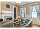 Kitchen island with gas cooktop and granite countertop at 214 College St, Oxford, NC 27565