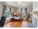 bedroom with a bunk bed, hardwood floors, and ample natural light at 214 College St, Oxford, NC 27565