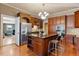 Kitchen with island, stainless steel appliances, and ample cabinetry at 214 College St, Oxford, NC 27565