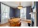 Formal dining room with hardwood floors and fireplace at 214 College St, Oxford, NC 27565