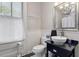 Bathroom with pedestal sink and walk-in shower at 214 College St, Oxford, NC 27565