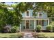 Two-story home with porch and landscaping at 214 College St, Oxford, NC 27565