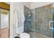Bathroom with a toilet, shower and a large slate tile shower at 214 College St, Oxford, NC 27565