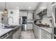 Modern kitchen with farmhouse sink and stainless steel appliances at 665 Brycewood Drive Dr, Burlington, NC 27215