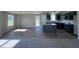Open kitchen features granite countertops and dark cabinetry at 98 Lotus Ave, Smithfield, NC 27577