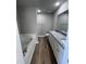 Double vanity bathroom with soaking tub at 98 Lotus Ave, Smithfield, NC 27577
